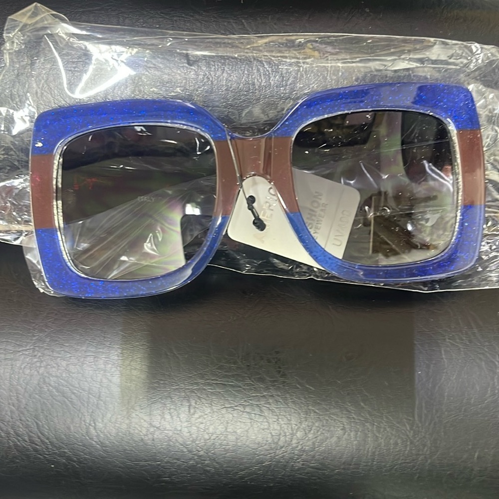 Blue and brown with silver sparkles on the back of them